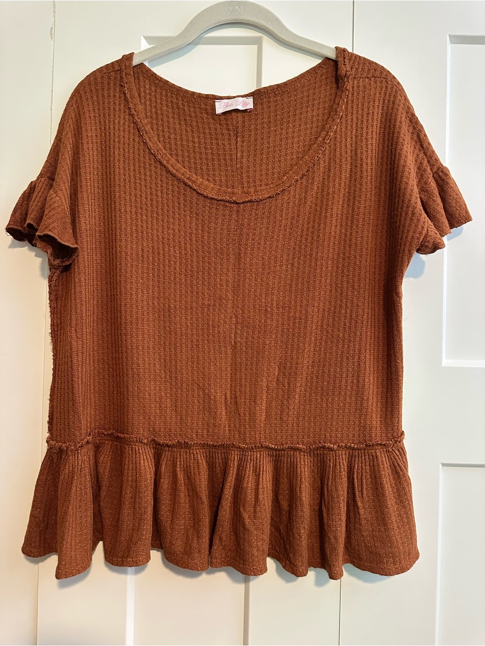 Pink Lily Waffle Knit Ruffle Top with Exposed Seams - Rust Color